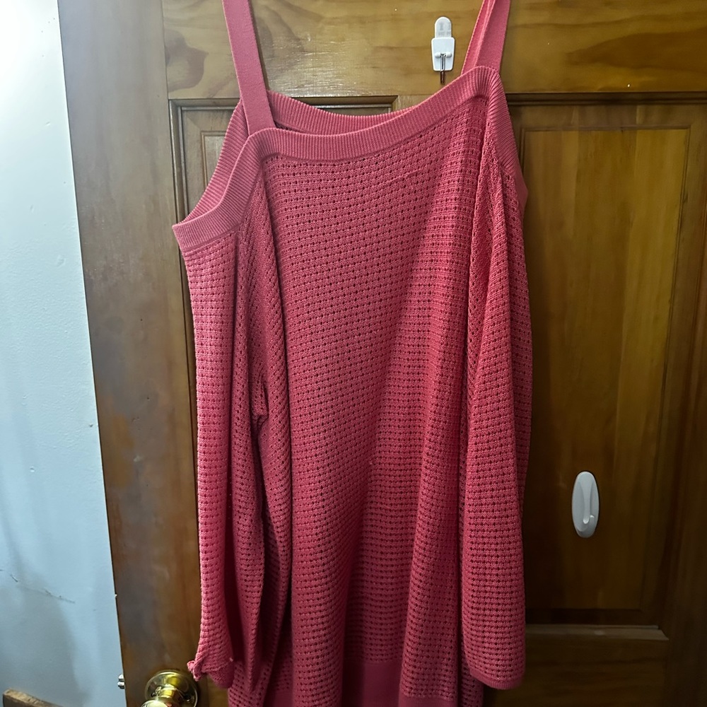 Cold shoulder light sweater. There’s a tiny pull in the sweater.